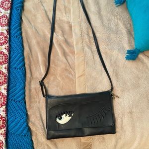 Crossbody “Winking” Bag